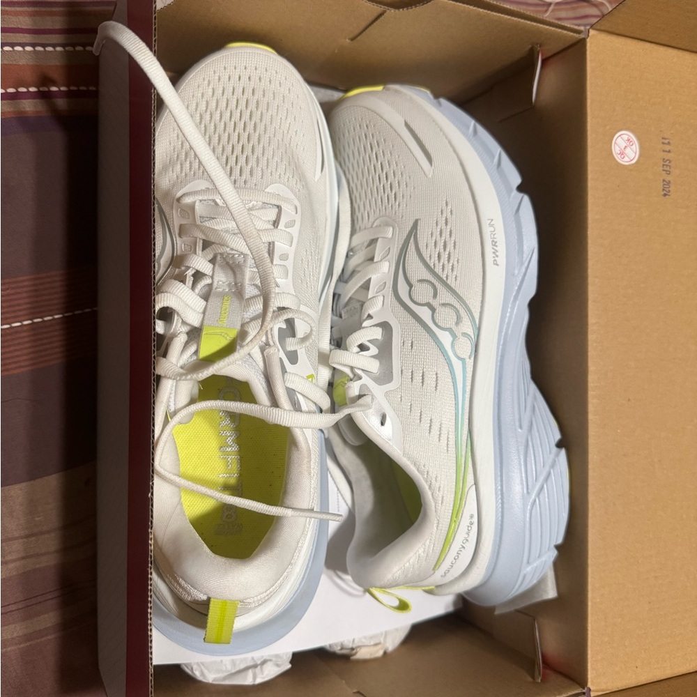 Saucony White and Yellow Athletic Shoes with Cushioned Sole